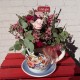 Taza con flor preservada